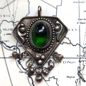 Oxidized silver pendant with green stone